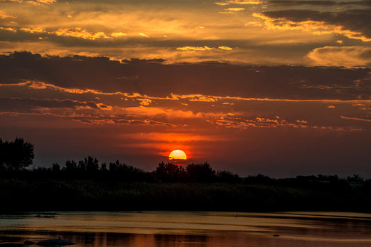 Last Light: Sunset Descent by Andriette Pretorius